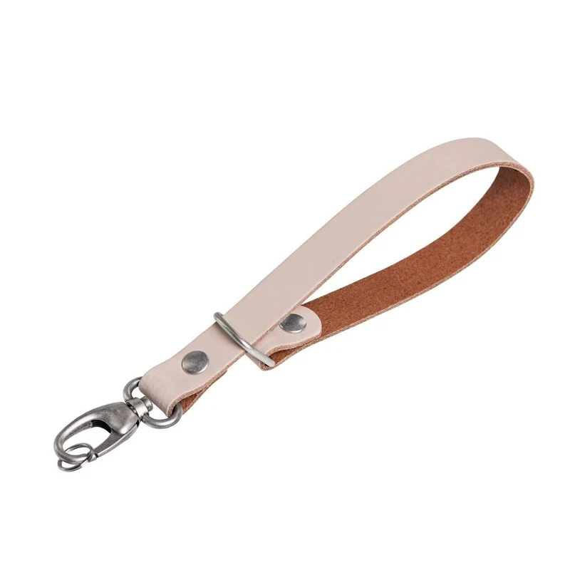 Das Hantler Handgelenkband Elfenbein / Messing