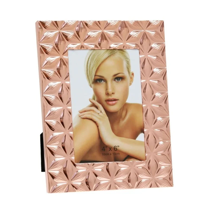Deknudt Wide photo frame with floral pattern in glossy copper colour 10x15 S58MR5